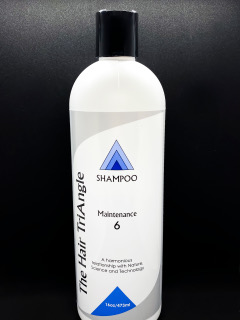 A bottle of shampoo for hair growth