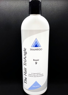 A bottle of shampoo for hair triangles