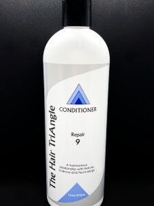 A bottle of conditioner for hair is shown.